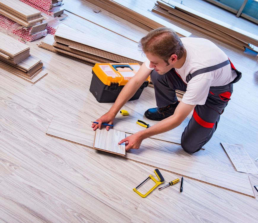 Contractor in Salt Lake City, UT with liability insurance, working on a floor installation
