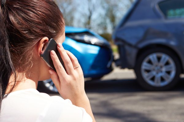 woman on phone with car insurance in Murray, UT