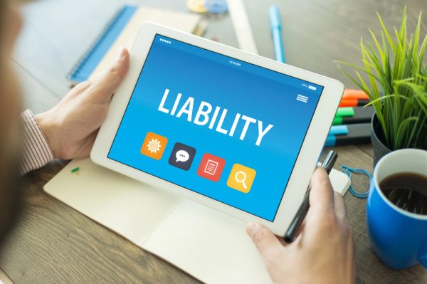 looking at Liability Insurance on a tablet in Sandy, UT
